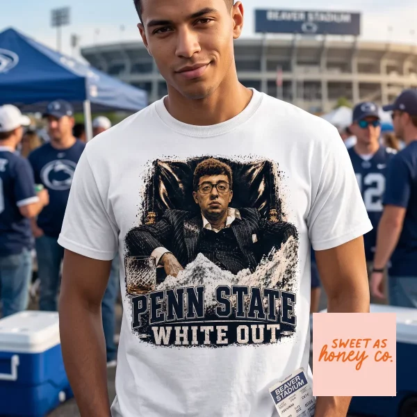 Penn State White Out 2026 Pablo Pledgescobar Meme Shirt 2 Charcoal grey unisex t-shirt featuring a satirical Pablo Pledgescobar graphic with Penn State White Out text on a rustic wood background. (Detail view #3)